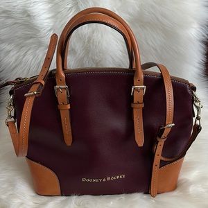Dooney & Bourke purse, wine color with tan trim.